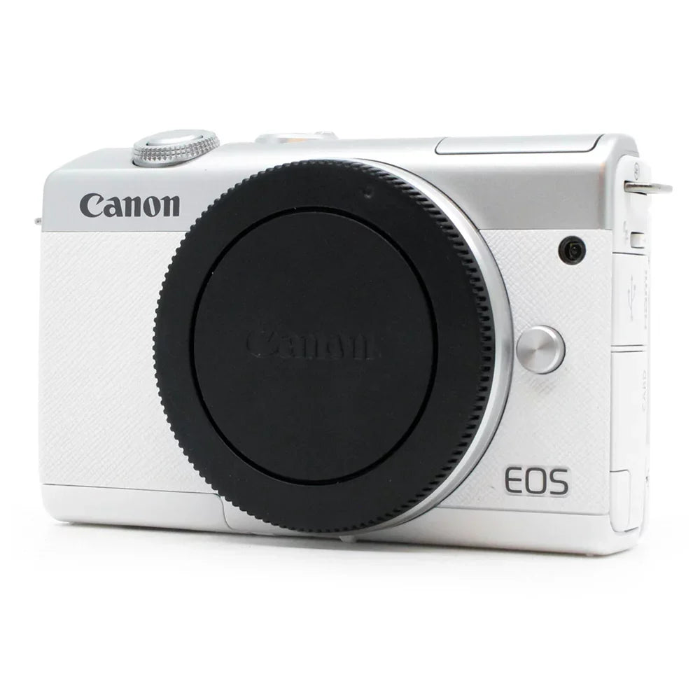 Canon EOS M200 DSLR Camera (White) + Canon 15-45mm IS STM Lens + 32GB Class 10 Memory Card + Canon EOS Shoulder Bag 100ES + 58mm UV Filter + Card Reader + Lens Cap Holder - International Version